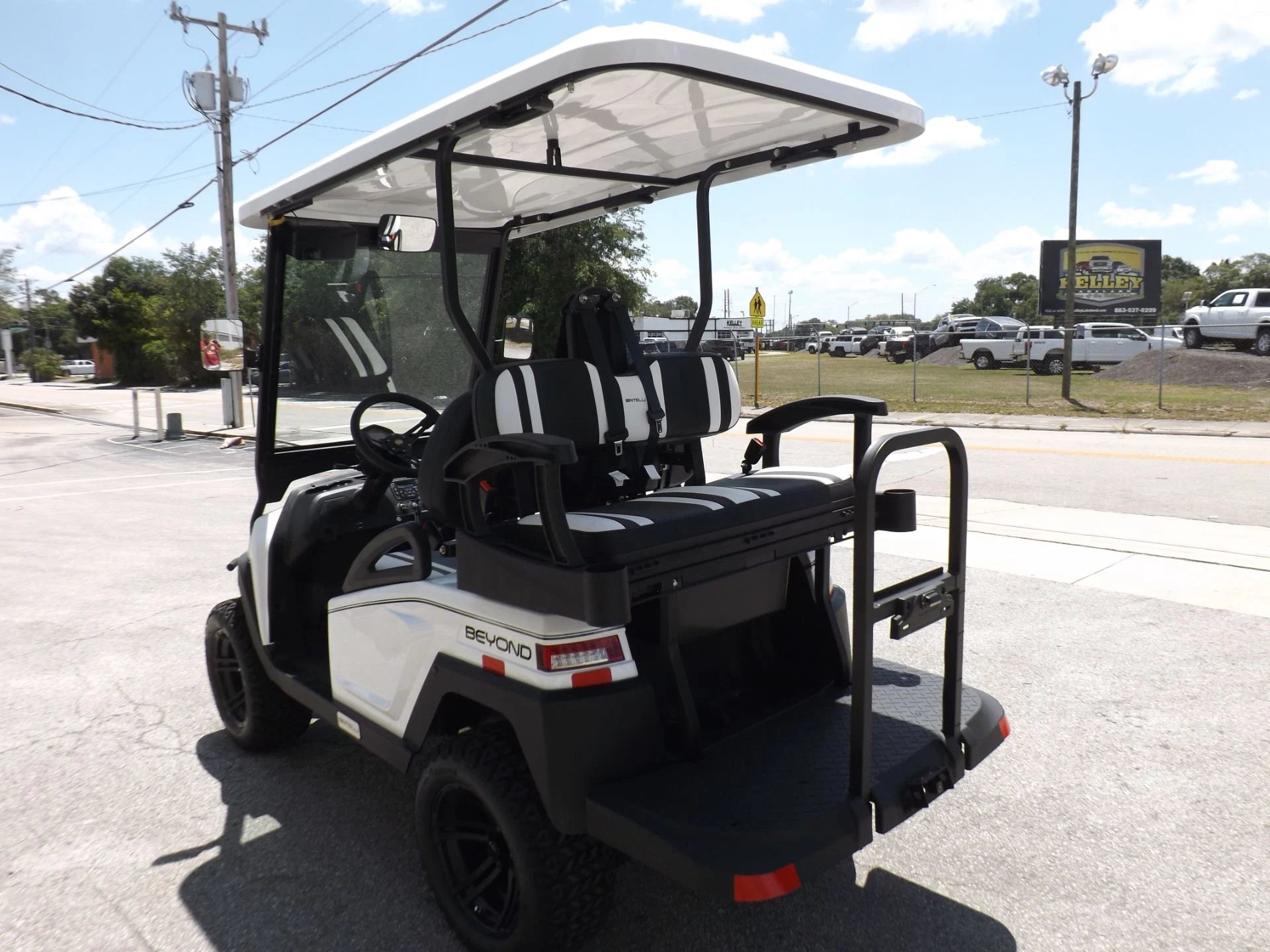 White 2022 Bintelli BEYOND 4P Lifted Golf Cart for Sale image 4